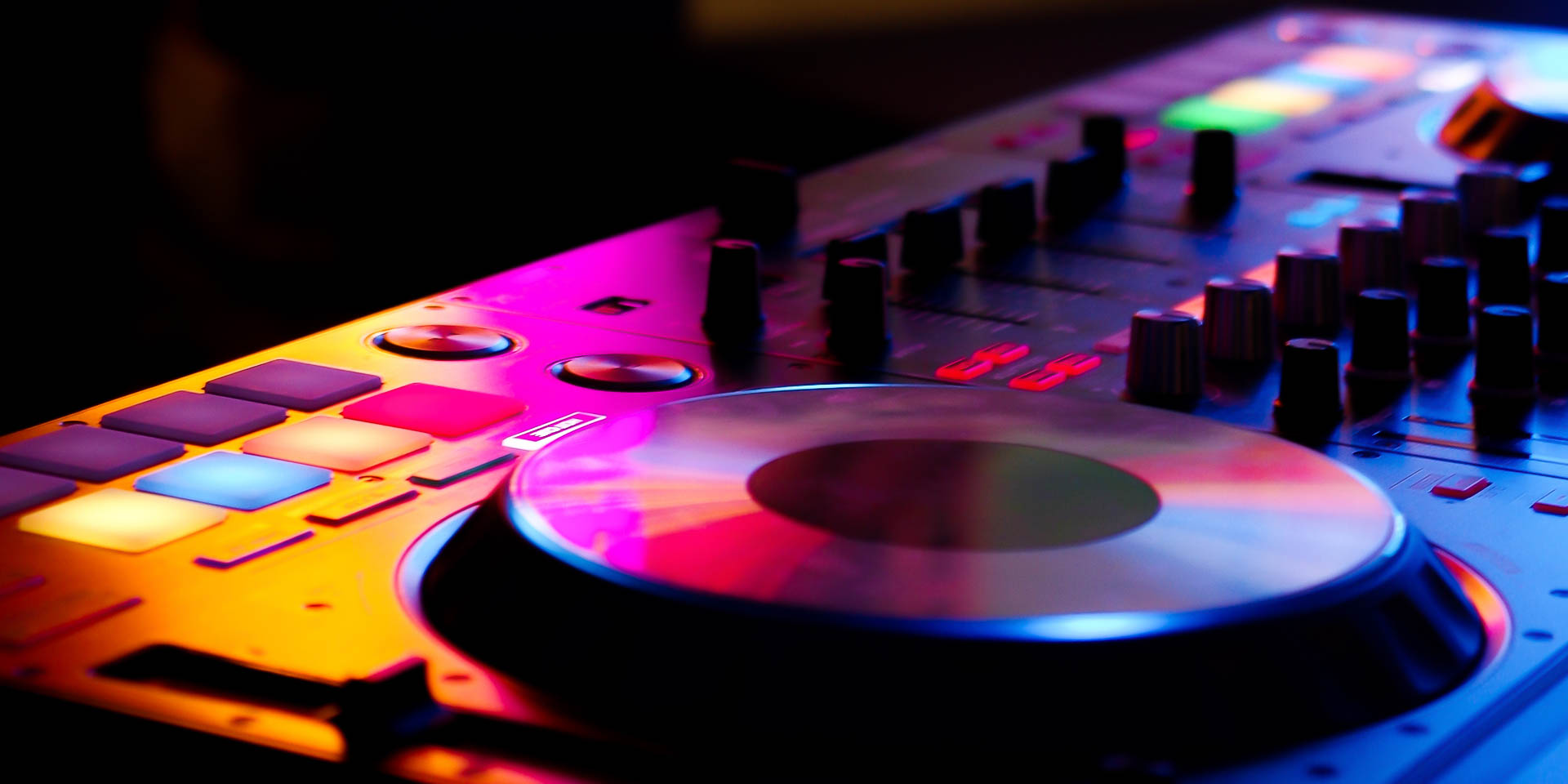 DJ console with display panel, controls and buttons