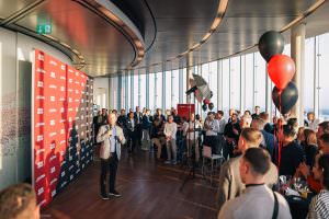 A Life Fitness employee welcomes guests to an after-show event in Cologne.