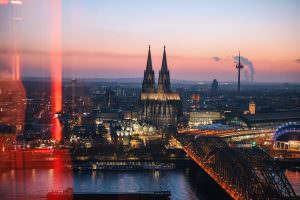 View of the illuminated Cologne Cathedral from the KölnSKY event location.