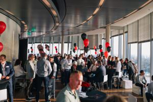 Guests network at an after-trade fair event in Cologne to the music of DJ Markus Rosenbaum.