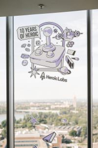 Company anniversary at KölnSKY during Gamescom: Branding detail 10 Years of Heroic Labs sticker at the exclusive event with DJ accompaniment.