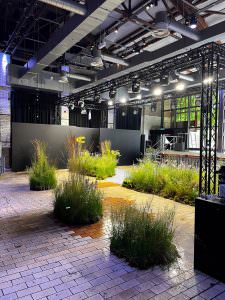 Modern interior view of the Seifenfabrik event venue with stylishly integrated grasses for a natural feel-good atmosphere.
